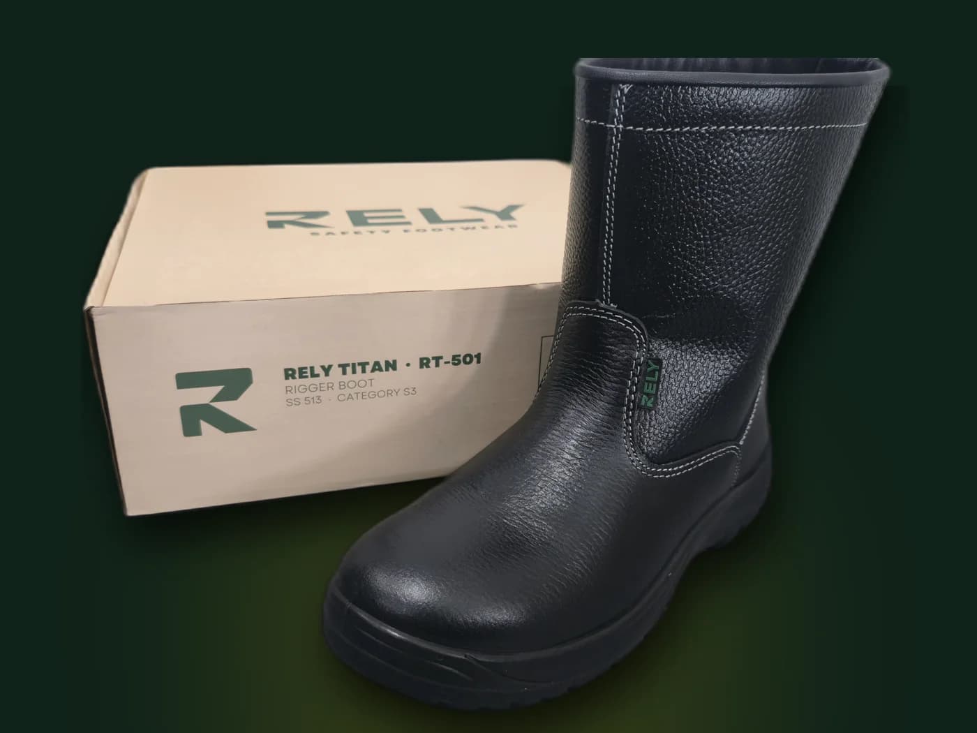 Rely Titan boot beside its box